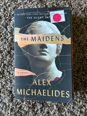 Source Unknown The Maidens Paperback - Black, Cream, Gold